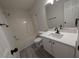 Updated bathroom featuring a tub/shower combo and modern vanity at 1032 Holly Pointe Dr, Wendell, NC 27591
