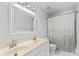 The bathroom has double sinks, a shower with a curtain, and an oval mirror at 104 Glenmore Rd, Cary, NC 27519