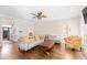 Spacious living room boasts hardwood floors, comfortable seating, and a welcoming atmosphere at 104 Glenmore Rd, Cary, NC 27519