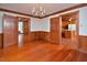 Open-concept dining room with hardwood floors and easy access to the kitchen at 104 Parker St, Oxford, NC 27565