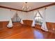 Elegant dining room featuring hardwood floors, chandelier lighting, and detailed molding at 104 Parker St, Oxford, NC 27565