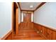Foyer boasts natural light, a wood door, and wood flooring at 104 Parker St, Oxford, NC 27565