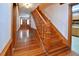 Traditional foyer with wood staircase, hardwood floors and stained-glass front door at 104 Parker St, Oxford, NC 27565