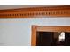 This interior showcases beautiful wood trim details, decorative wallpaper and craftsmanship at 104 Parker St, Oxford, NC 27565