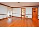 Charming living room with hardwood floors, and a window with backyard view at 104 Parker St, Oxford, NC 27565