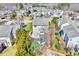 Aerial view showcases the home's location within a verdant, established neighborhood at 105 Presley Snow Ct, Holly Springs, NC 27540