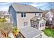 Two-story home with a spacious deck and a beautiful backyard at 105 Presley Snow Ct, Holly Springs, NC 27540
