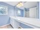 Spacious bathroom featuring a double vanity, large mirror and shower at 105 Presley Snow Ct, Holly Springs, NC 27540