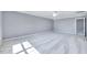Large bedroom offering lots of natural light and space at 105 Presley Snow Ct, Holly Springs, NC 27540
