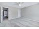 Spacious bedroom with ceiling fan, new carpet, and lots of natural light at 105 Presley Snow Ct, Holly Springs, NC 27540