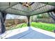 Backyard gazebo with ample seating, perfect for outdoor gatherings at 105 Presley Snow Ct, Holly Springs, NC 27540