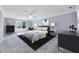 This is the main bedroom suite offering space, a sitting area, and modern fixtures at 105 Presley Snow Ct, Holly Springs, NC 27540