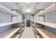 Spacious walk-in closet features custom shelving and ample storage solutions at 105 Presley Snow Ct, Holly Springs, NC 27540
