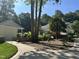 Serene backyard with lush landscaping and a well-maintained lawn, offering a private and tranquil outdoor space at 106 Woodkirk Ln, Chapel Hill, NC 27514