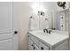 Updated bathroom featuring modern fixtures and a sink with white cabinets at 106 Woodkirk Ln, Chapel Hill, NC 27514