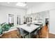 Bright and airy kitchen featuring a skylight and a spacious island with bar stool seating at 106 Woodkirk Ln, Chapel Hill, NC 27514