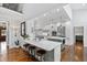 Modern kitchen with stainless steel appliances, granite countertops, and a breakfast bar at 106 Woodkirk Ln, Chapel Hill, NC 27514