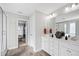 This bathroom features a double vanity, tile floors, and a glass enclosed shower at 1213 Valley Dale Dr, Fuquay Varina, NC 27526