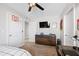 This is a bedroom with a view, and a ceiling fan and plenty of light at 1213 Valley Dale Dr, Fuquay Varina, NC 27526