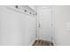 Clean entryway featuring beadboard walls, coat hooks, and a door to the exterior at 1213 Valley Dale Dr, Fuquay Varina, NC 27526
