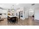 Spacious kitchen with a large island, white cabinets, stainless steel appliances, and open access to other living areas at 1213 Valley Dale Dr, Fuquay Varina, NC 27526