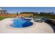 Private in-ground pool featuring tanning chairs, turf and a privacy fence at 1213 Valley Dale Dr, Fuquay Varina, NC 27526