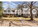 Exterior view of building featuring well-manicured lawn and traditional architecture at 1221 Renshaw Ct, Cary, NC 27518