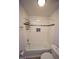 Bathroom with white tile and tub with shower at 1501 Ramson Ct, Raleigh, NC 27603