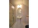 Cozy bathroom featuring a glass shower, pedestal sink, and neutral wall color at 1501 Ramson Ct, Raleigh, NC 27603