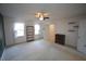 Large bedroom with carpet, ceiling fan, and ample natural light at 1501 Ramson Ct, Raleigh, NC 27603