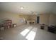 Open bonus room featuring neutral walls, carpet, ceiling fan and natural light at 1501 Ramson Ct, Raleigh, NC 27603