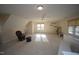 Large bonus room with carpet, natural light, and ceiling fan at 1501 Ramson Ct, Raleigh, NC 27603