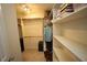 Walk-in closet featuring shelving and hanging storage at 1501 Ramson Ct, Raleigh, NC 27603