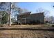 An elevated view of the exterior of the house, deck, and spacious backyard at 1501 Ramson Ct, Raleigh, NC 27603