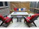 Back deck with fire pit, seating and wooded view at 156 Stoney Creek Way, Chapel Hill, NC 27517