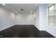 Unfinished basement with neutral paint, wood floors, and natural light at 156 Stoney Creek Way, Chapel Hill, NC 27517
