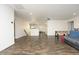 Open basement area with foosball table and ample space for recreation and entertaining at 156 Stoney Creek Way, Chapel Hill, NC 27517