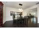 Dining room with hardwood floors, modern light fixture, and stylish decor at 156 Stoney Creek Way, Chapel Hill, NC 27517
