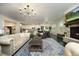 Spacious living room featuring a stone fireplace, hardwood floors, and an open floor plan at 156 Stoney Creek Way, Chapel Hill, NC 27517