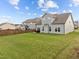 Expansive backyard with a well-maintained lawn, surrounded by privacy fences, ideal for recreation and entertaining at 190 Hickory Run Ln, Franklinton, NC 27525