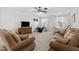 Large bonus room with TV and couch, offering a versatile space for entertainment and relaxation at 190 Hickory Run Ln, Franklinton, NC 27525