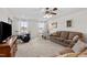 Versatile bonus room with TV and ample seating, adaptable for media, play, or recreation at 190 Hickory Run Ln, Franklinton, NC 27525