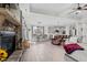 Open-concept living area with fireplace, dining space, and kitchen, perfect for entertaining and Gathering time at 190 Hickory Run Ln, Franklinton, NC 27525
