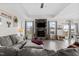 Spacious living room with fireplace, tray ceiling, and plenty of natural light, perfect for relaxation at 190 Hickory Run Ln, Franklinton, NC 27525