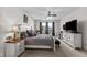 Calm bedroom featuring neutral tones, comfy bed, plenty of natural light, and elegant furnishings at 190 Hickory Run Ln, Franklinton, NC 27525