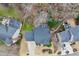 Birds eye view of a two-story home with lush greenery and a neatly kept lawn at 200 Parkbranch Ln, Cary, NC 27519