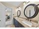 Bathroom featuring granite countertops, a tile floor and dual sinks at 200 Parkbranch Ln, Cary, NC 27519