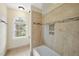 Bright bathroom with a tiled shower and a garden tub at 200 Parkbranch Ln, Cary, NC 27519