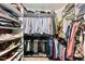 Walk-in closet with clothing racks and shoe storage at 200 Parkbranch Ln, Cary, NC 27519