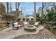 Charming outdoor fire pit area with comfortable seating and a cozy ambiance for entertaining at 200 Parkbranch Ln, Cary, NC 27519